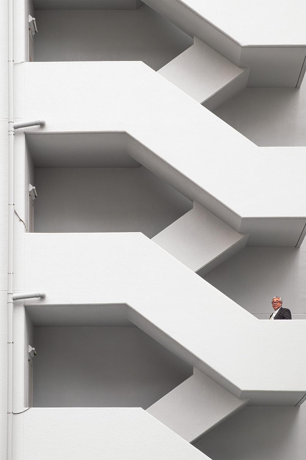 Man On A Balcony by Doug Caplan