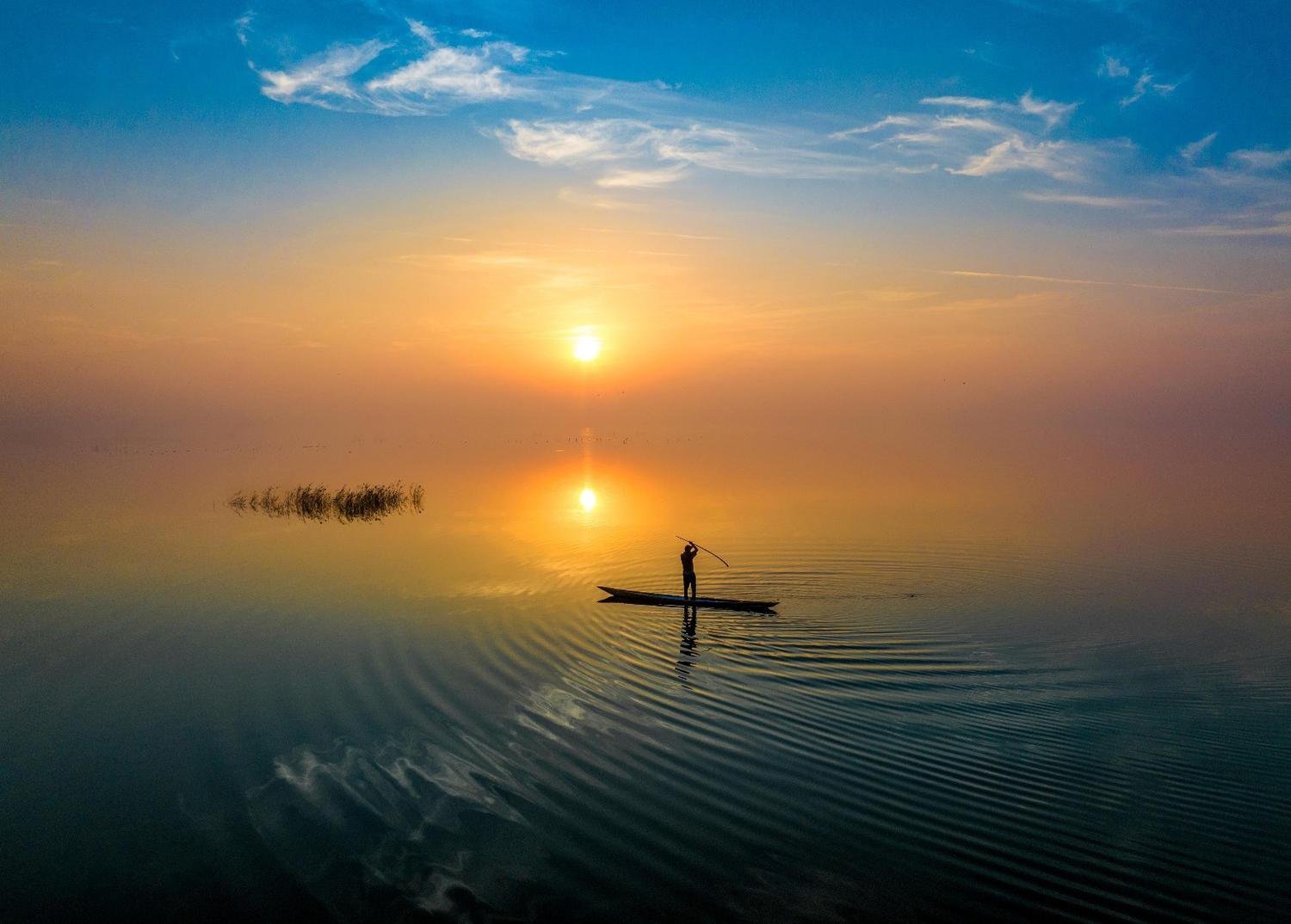 The Silent Oar of Hawizeh Marsh by Arash Radmanesh